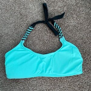 Teal and black swimsuit top